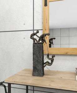 gray polystone people climbing decorative sculpture with bronze detailing, 7