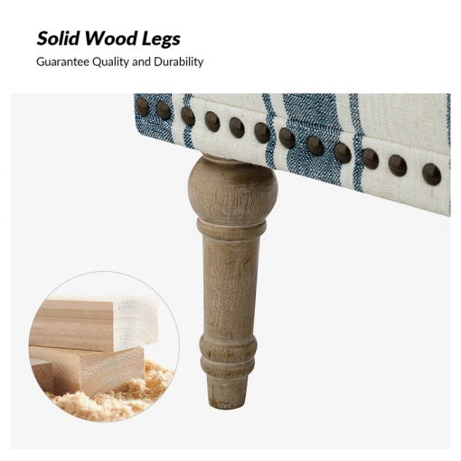arching armchair with solid wood legs and nailhead trim