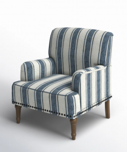 arching armchair with solid wood legs and nailhead trim