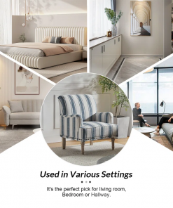 arching armchair with solid wood legs and nailhead trim