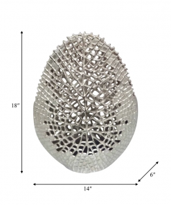 decorative aluminum vase with organic cutout design sculptural metal accent piece modern abstract openwork motif freestanding etched detailing artisan style vase contemporary home decor element.