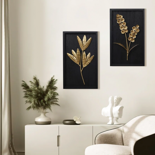 gold flowers and plants with black wood back and frame wall decor